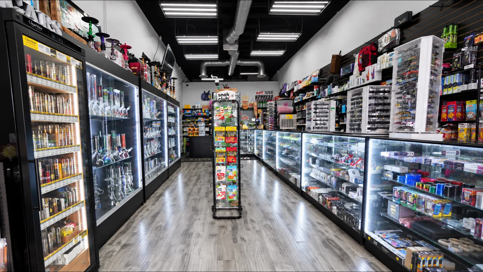 The main aisle of glass cases